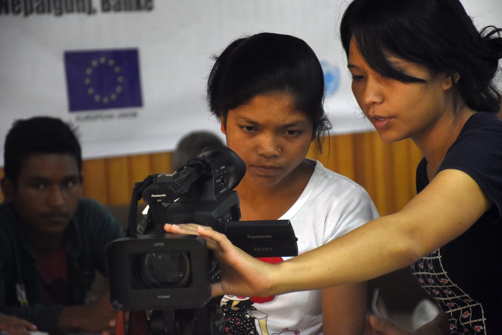 UNICEF Nepal (@unicef_nepal) on Twitter photo <a href="/EUinNepal/">EU in Nepal</a> @MSNPNepal <a href="/UN_Nepal/">United Nations in Nepal</a> <a href="/UNICEF_EU/">UNICEF Representation to EU Institutions</a> <a href="/theoneminutesjr/">theoneminutesjr.</a> Learning to pan: Suman Sunar of Kalikot District learning camera movement during 'producing one minute junior video' workshop. <a href="/EUinNepal/">EU in Nepal</a> @MSNPNepal <a href="/UN_Nepal/">United Nations in Nepal</a> <a href="/UNICEF_EU/">UNICEF Representation to EU Institutions</a> <a href="/theoneminutesjr/">theoneminutesjr.</a> Learning to pan: Suman Sunar of Kalikot District learning camera movement during 'producing one minute junior video' workshop.