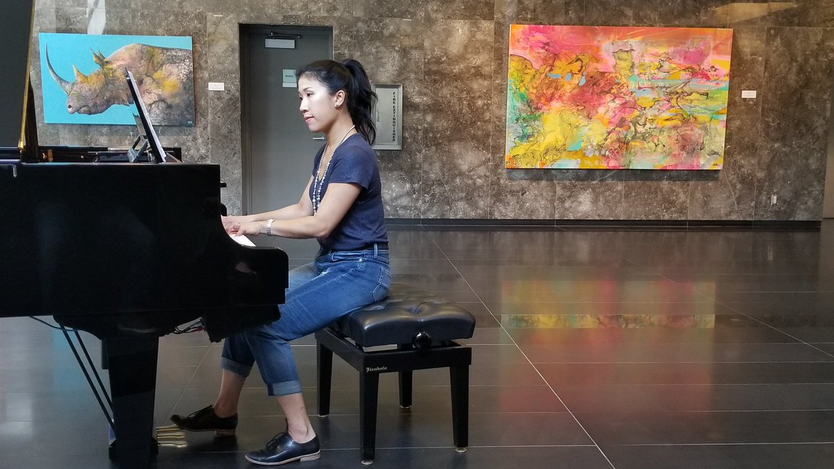 Pleased to have <a href="/misssarahchan/">Sarah Chan (she/her), M.A.</a> in our <a href="/EPCOR_Tower/">EPCOR Tower</a> lobby practicing for next week's #aneveningwithsarah. Tickets at eventbrite.ca/e/drinks-with-…