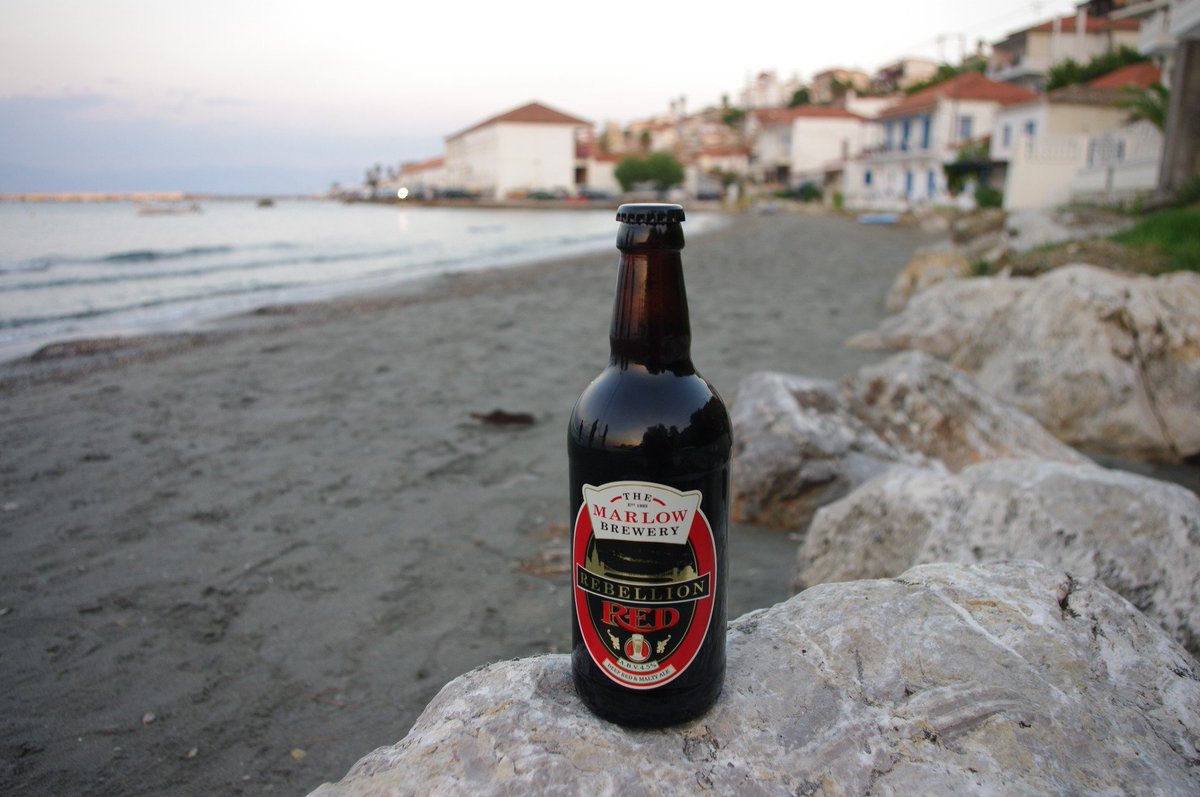 60rl's tweet image. Enjoying a bottle of @RebellionBeer Red on the beach in Koroni, Greece