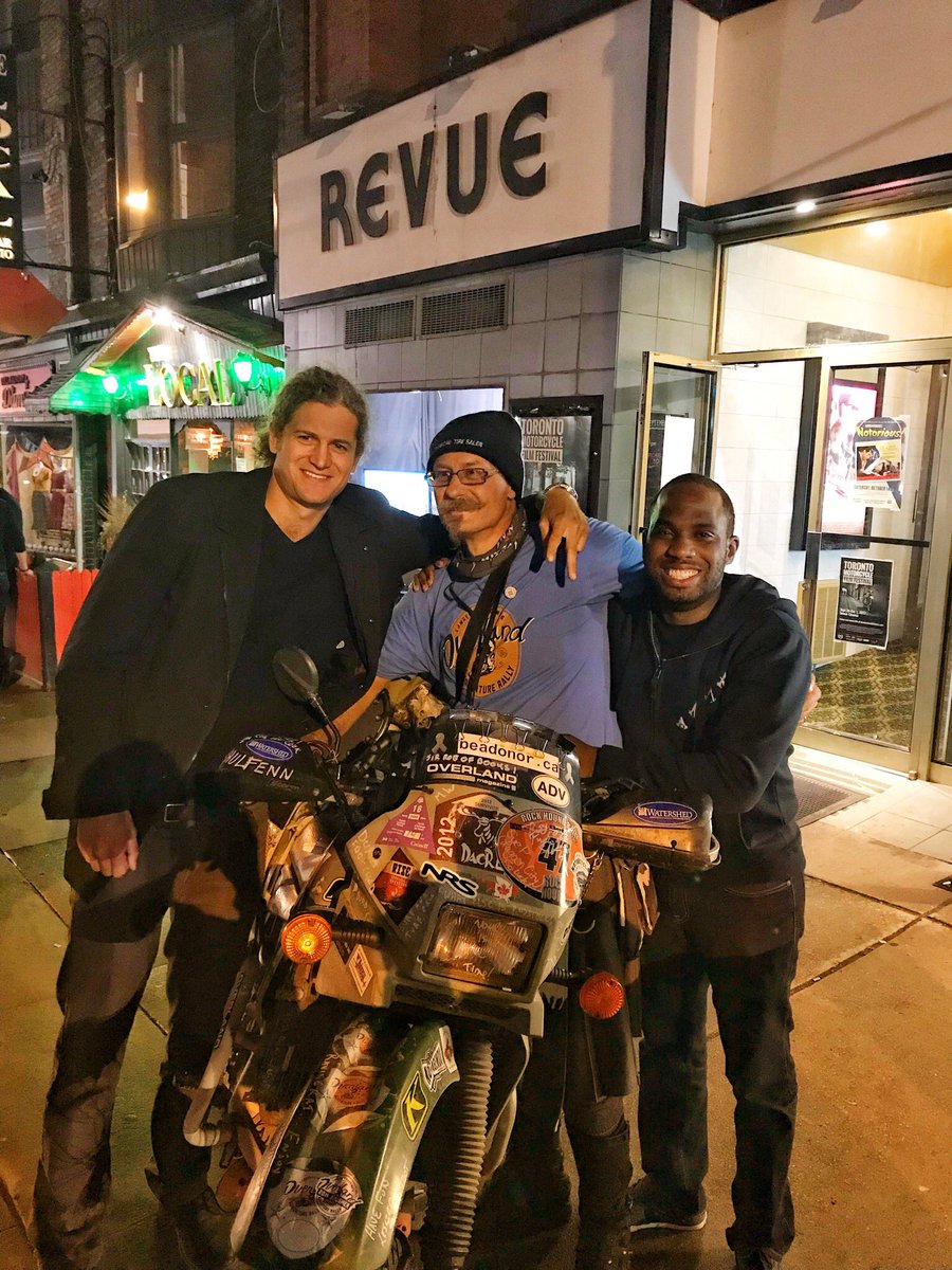 themotofilmfest's tweet photo. Director Jory Lyons, cast Oliver Solaro and crew Timothy Ashley, all from AKA Brokentooth, pose with Oliver’s bike at #tmff2017 late show. https://t.co/OGjvucGBns