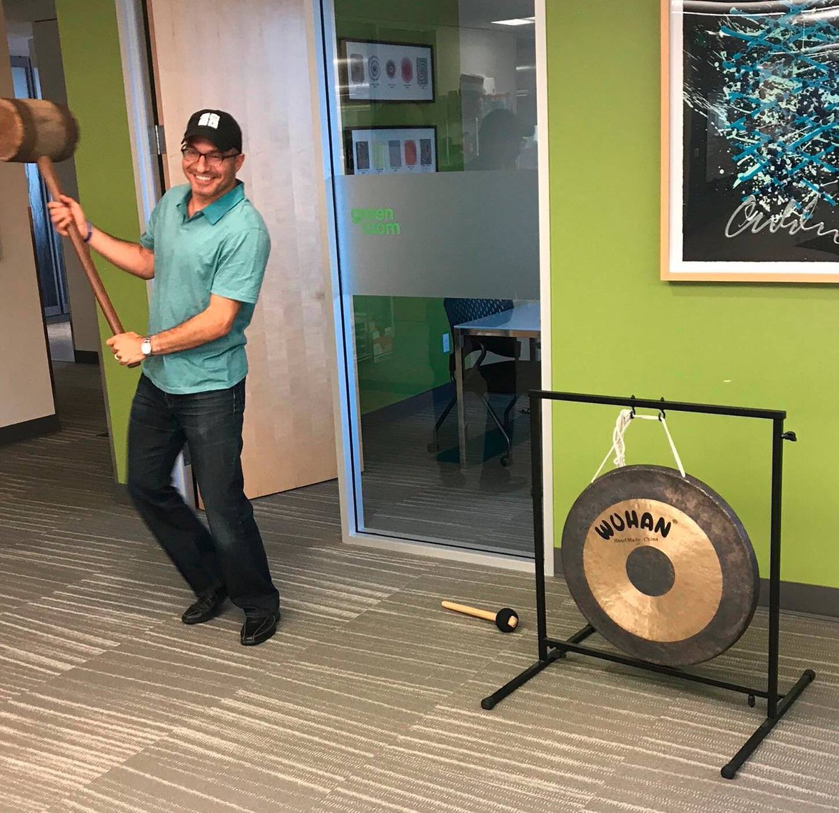 codeorg's tweet image. Our founder @hadip rings our office gong with a giant hammer, to celebrate $1.3B in funds for K-12 computer science. #CSforKids #CSforAll