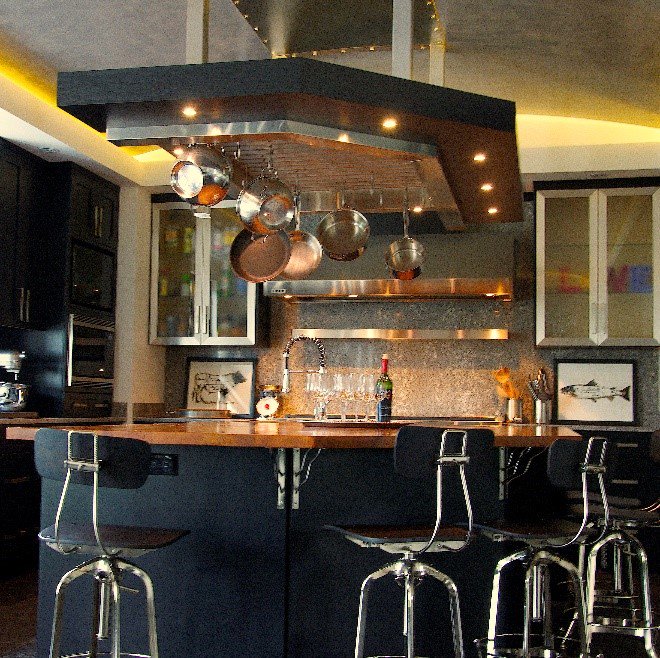 WolfeRizor's tweet photo. Copper and natural wood provide warmth against the solidity of black and steel in this Wolfe-Rizor kitchen design. #wrid https://t.co/hl9zSbYBls