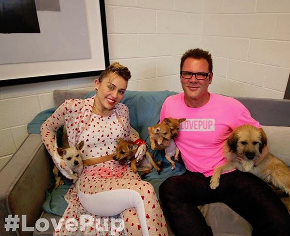 It's really awesome seeing a shirt we designed &amp; printed being worn by <a href="/JohnjayVanEs/">Johnjay Van Es</a> alongside <a href="/MileyCyrus/">Miley Cyrus</a>. #LovePup all the way!