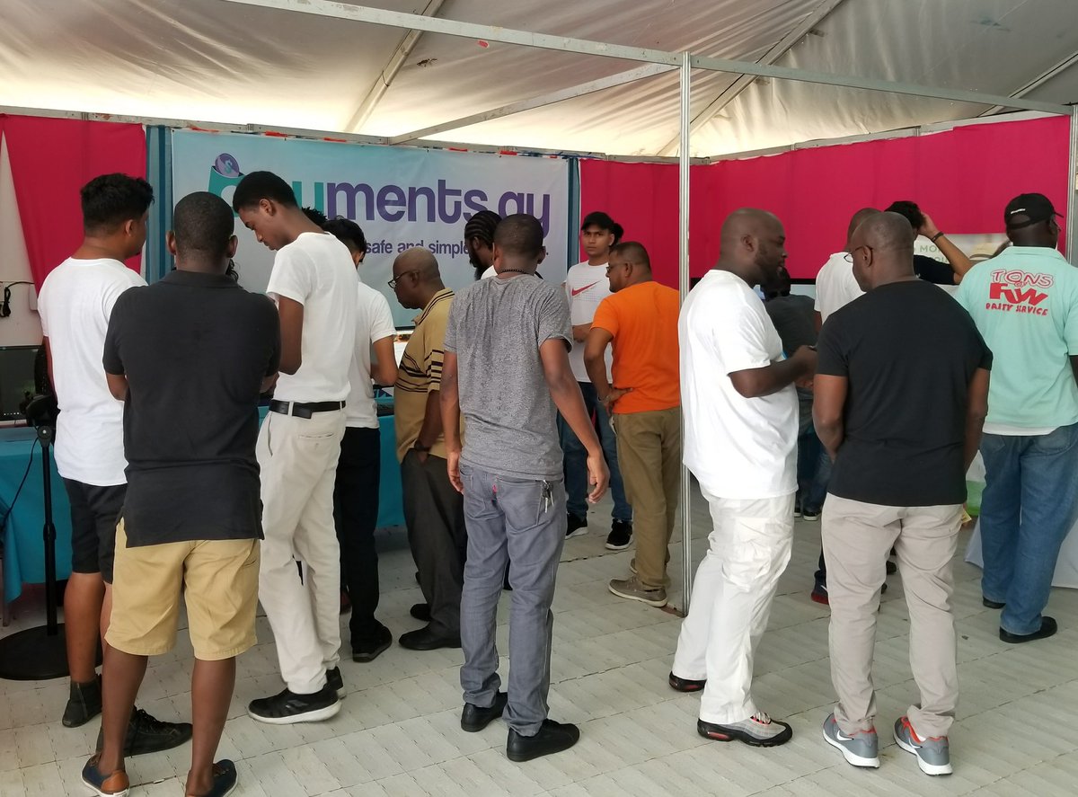 #Throwback to our team at GTT Blaze Expo talking to the public about how our app will shake things up! #TBT #Guyana #Tech #Innovation