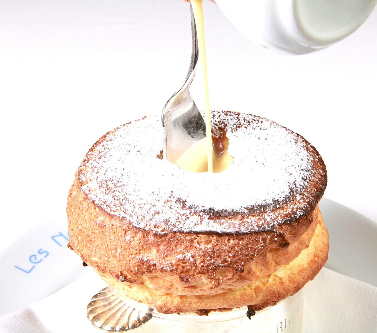 Grand Marnier soufflé. <a href="/LesNomadesChi/">Les Nomades</a>