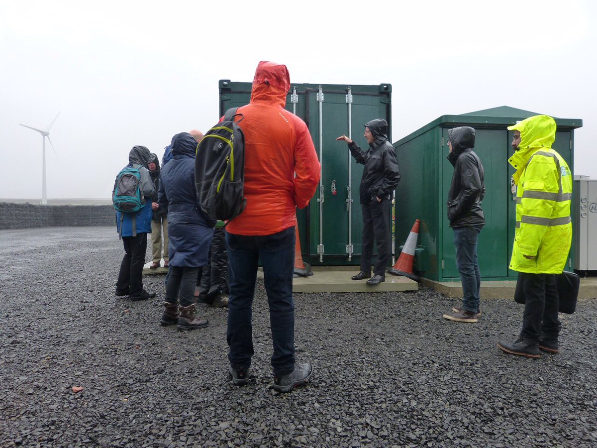 H2KH's tweet photo. Me presenting the @ITMPowerPlc 0.5MW Electrolyser supplied to @EMEC_Orkney, in horizontal rain https://t.co/ny4sCP2YIl