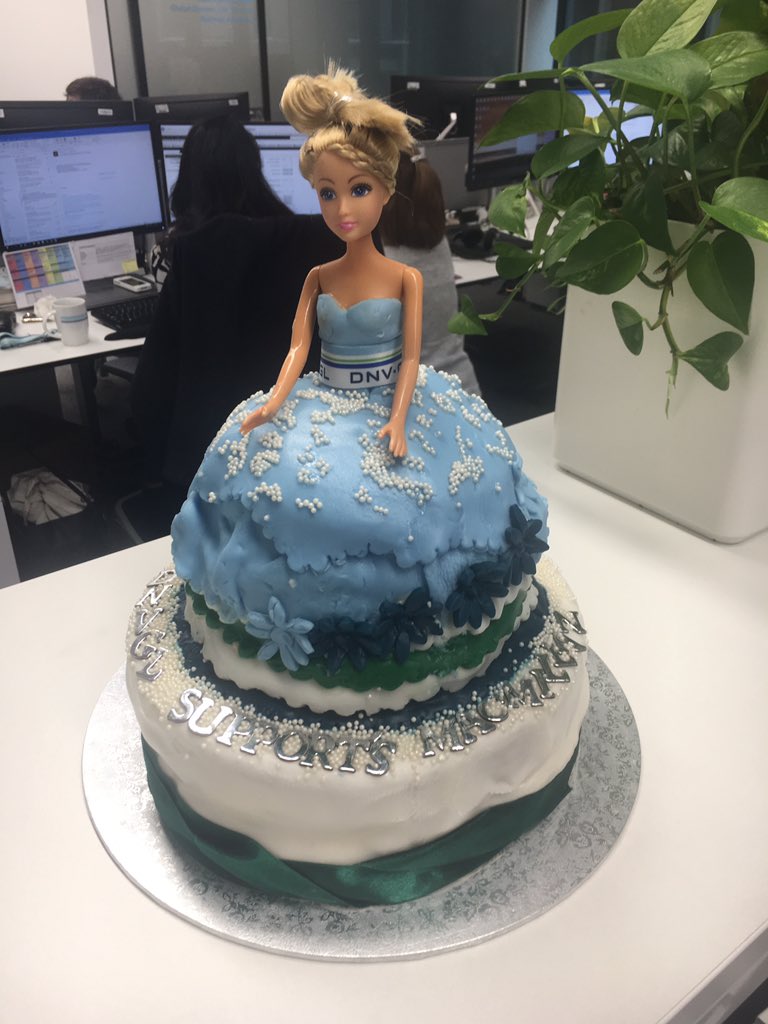 romagoreback's tweet photo. @KateBruintjes @macmillancoffee Someone in the London office made this DNV GL corporate Barbie cake https://t.co/axOJdeD1tW
