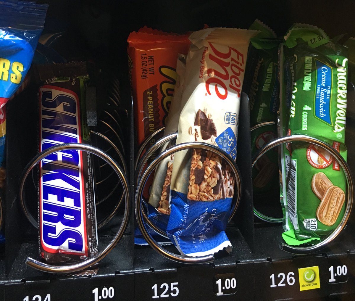 _denniscullen's tweet photo. When the vending machine has Reese's but you have to buy two Fiber One bars to get them #notcool https://t.co/VqqNELv56N