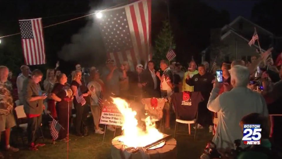 Over 100 people turn out for New England Patriots jersey burning