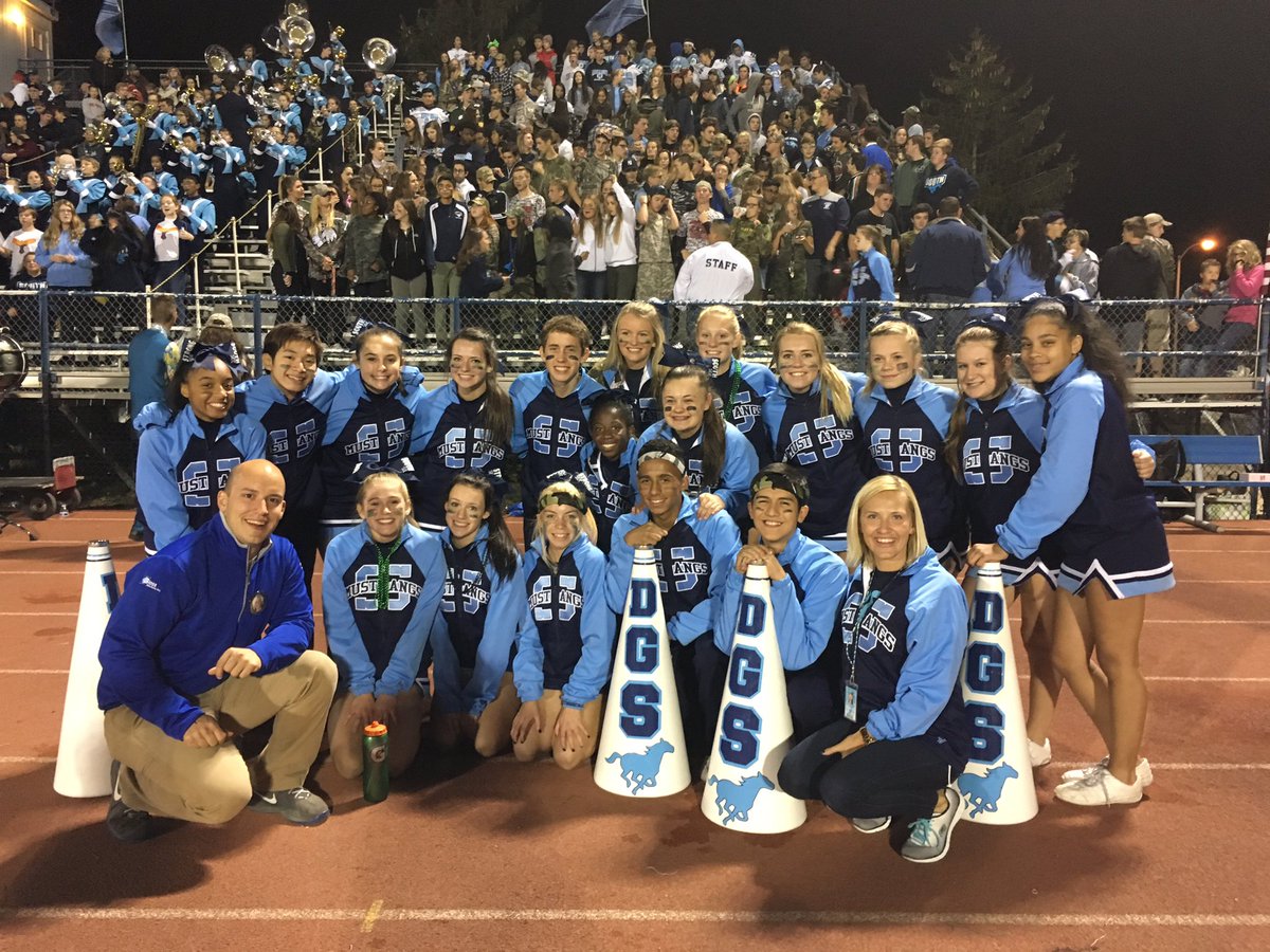 DGS_Cheer's tweet photo. Happy Homecoming Mustangs, Way to take home the Win! @DGS_Football @DGSSports #varsityfamilyphoto #dgspride #wearedownersgrovesouth https://t.co/zB0QWduvR8