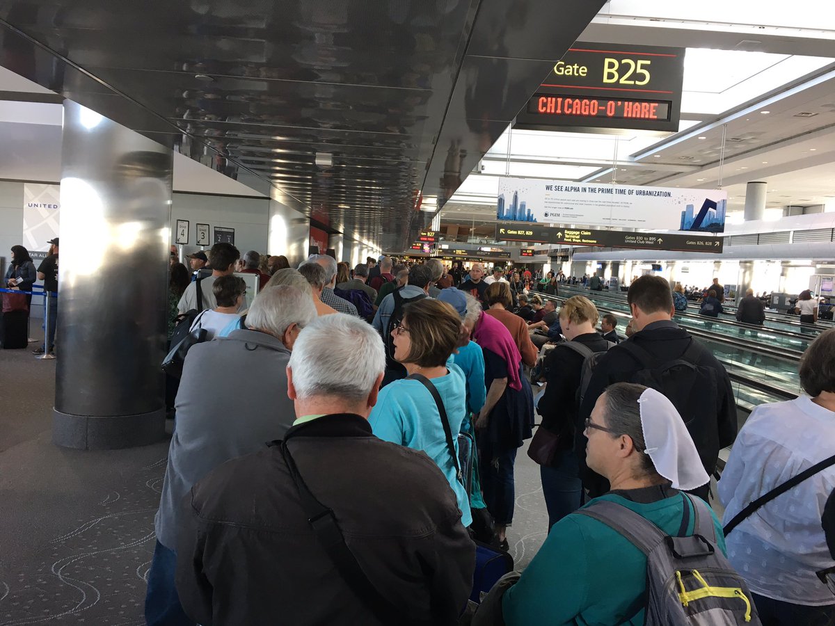 KickingBronco's tweet photo. Nothing like blocking the entire concourse to board @UnitedAirlines flight from Denver.What a mess! Not efficient &amp; discourteous to DIA. https://t.co/GPYuadsRgH