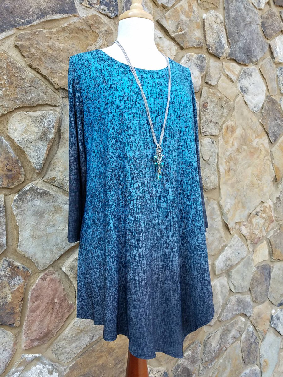 crawfordcollect's tweet photo. Need a vibrant, blue, ombre, asymmetrical, 3/4 sleeve tunic? We've got you covered! #clarasunwoo #CrawfordCollections https://t.co/omRaPevpUC