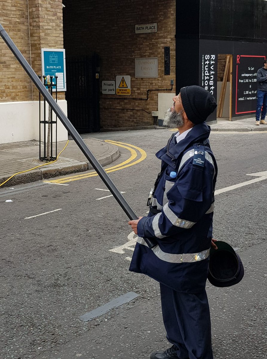LeeBurbidge's tweet photo. Traffic Warden holds window cleaners wfp whilst he moves his van of double yellow lines... lol https://t.co/3IWeaEge1L
