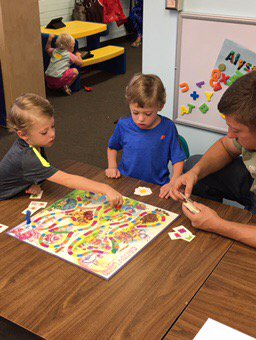 goetz_emily's tweet photo. 3yos play Candyland with Dad at playgroup. Colors, taking turns, 1-1 correspondence, these little do it all! #261pat https://t.co/FsNC7sYeQ1