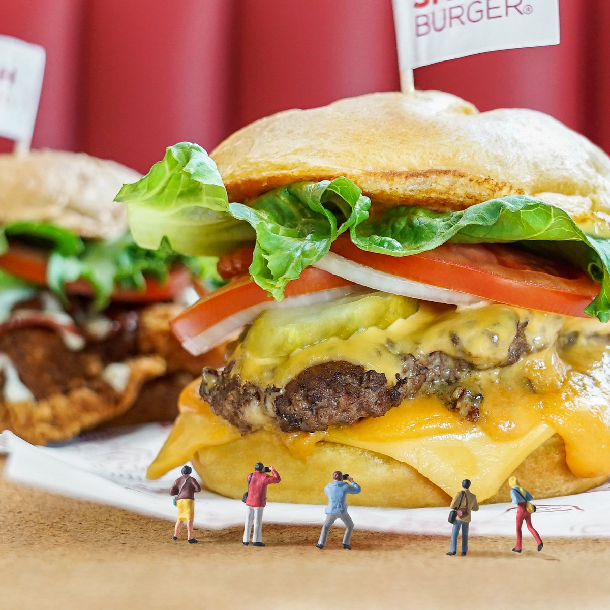 Smashburger's tweet photo. The best way to celebrate #NationalCheeseburgerDay? Devouring a #TripleDouble for just $4. 🍔🍔🍔 (only at participating locations) https://t.co/aF8hBI3wrQ