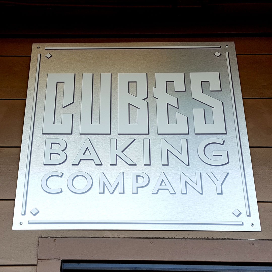 UnitedRepro's tweet photo. We stopped by the fabulous @cubesbaking this weekend to see their new brushed metal building sign…and to pick up some #cupcubes! #customsign https://t.co/6osBV7zAMd