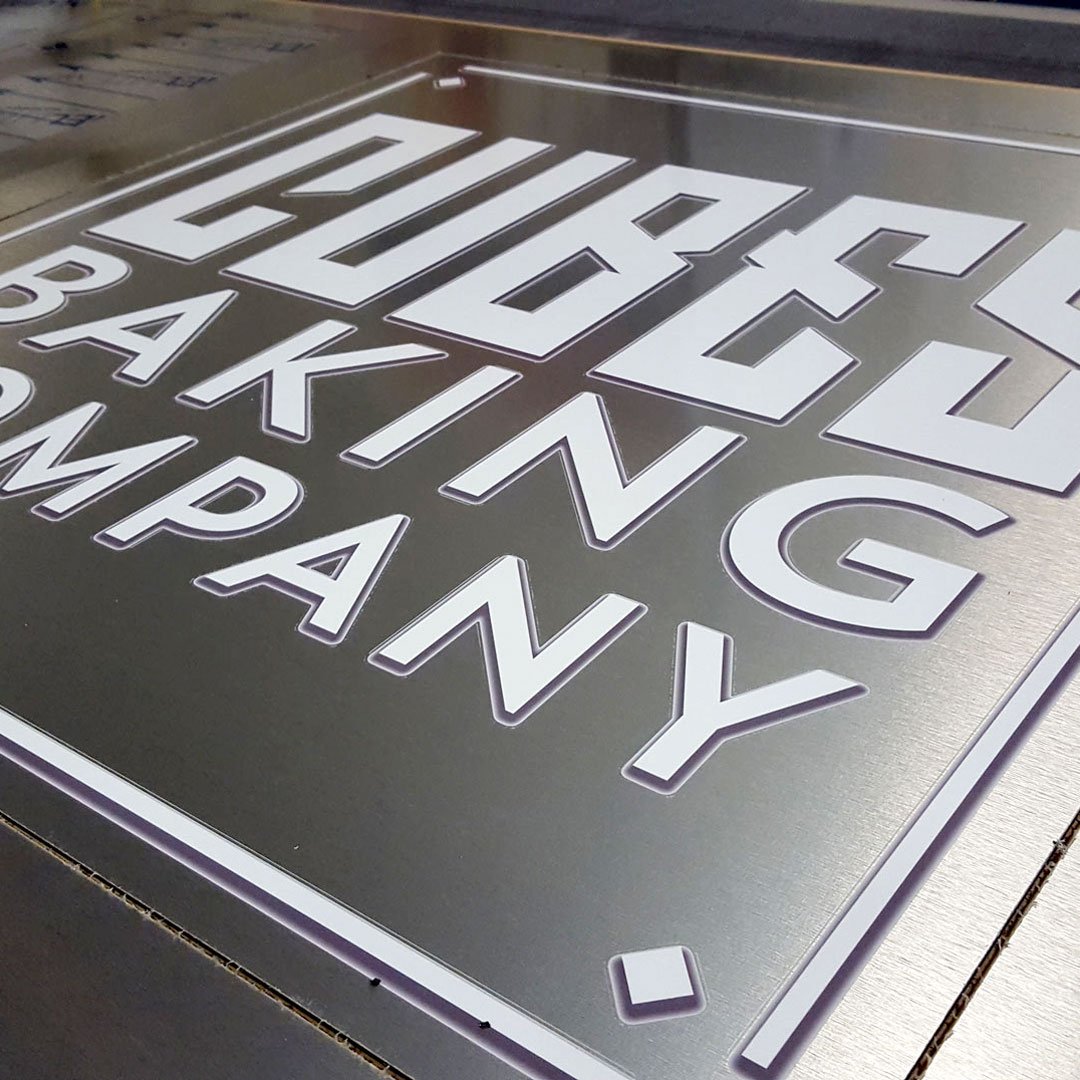 UnitedRepro's tweet photo. We stopped by the fabulous @cubesbaking this weekend to see their new brushed metal building sign…and to pick up some #cupcubes! #customsign https://t.co/6osBV7zAMd