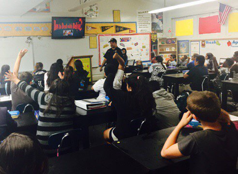 AESDinfo's tweet photo. SRO Vargas presents an anti-bullying message to 7th grade students!  #AESDexcellence in action! https://t.co/aET2jSJkKO
