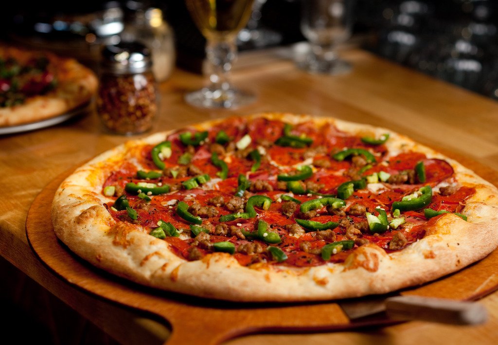 zeekspizza's tweet photo. One bite will warm you from the inside out. #TheDragon #AddSomeHeat #ZeeksPizza https://t.co/oE0qgM8frR