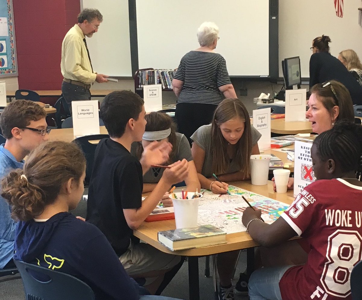 Teachers and students taking advantage of our amazing resources and activities in the media center!