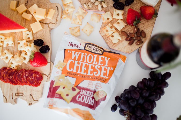 Creating a cozy evening at home with a delicious cheese and wine pairing! These <a href="/WholeyCheese/">Wholey Cheese</a> crackers are delicious! #WholeyCheese #ad