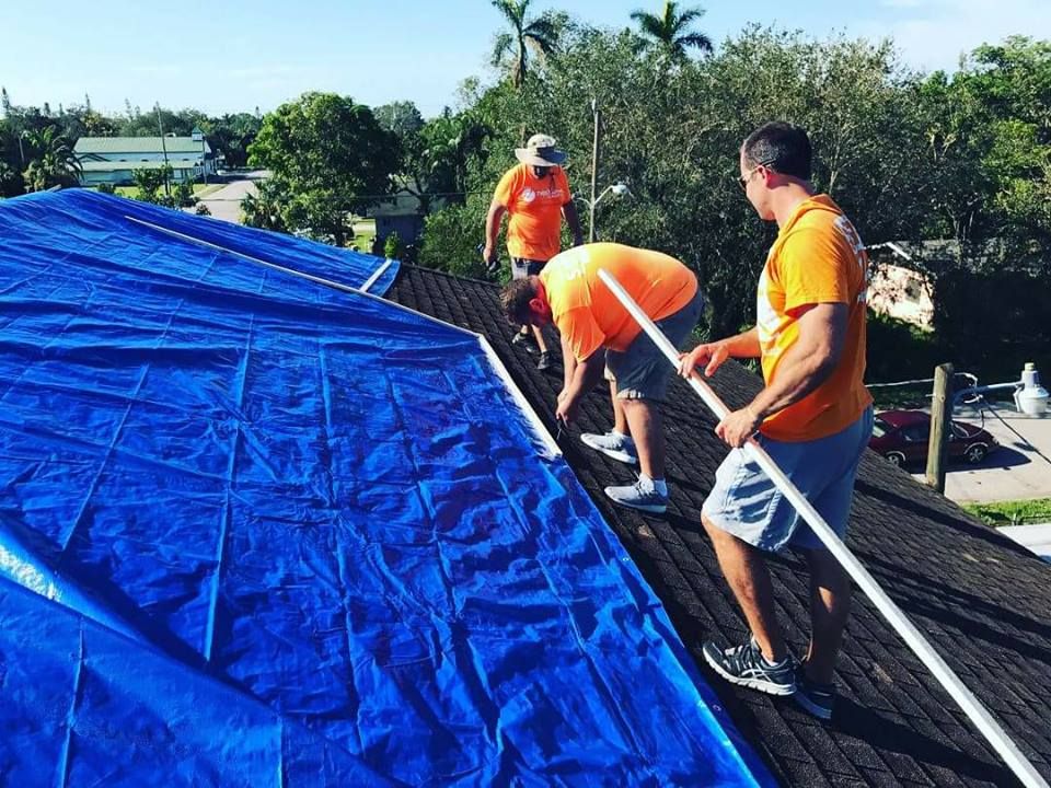 nextlevelswfl's tweet photo. #OrangeArmy covering  a leaking roof at Mount Hermon and served the nearby community. #IrmaRelief #ServeAllLoveAll #WeAreTheChurch https://t.co/1YZFQHaP6l