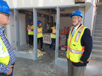 JaneATuttle's tweet image. Mark Reiske showing us the front doors of @KU_SAPEC new location in the Burge @KUunion #MovingCanBeFun
