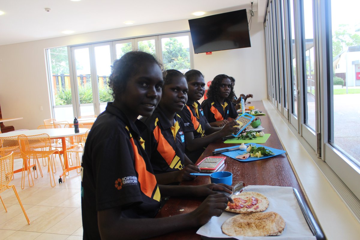 AFLNT's tweet photo. The Tiwi Island girls had lots of fun cooking and learning about healthy eating this week at the MLLLC!  #mlllc #schooleveryday https://t.co/rMCmQGlRnY