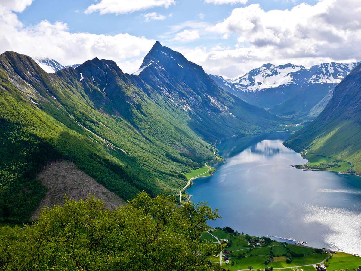 TravelMagazine's tweet photo. Climb up the fjords for a spectacular Norwegian panorama. @PlanetAppetite takes us on an 8-night guided walk ➡️ 
https://t.co/Tj1BTTd9At https://t.co/dJaayKuHYo