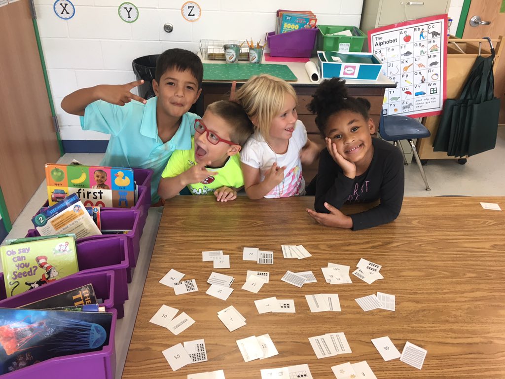 MrsLizWenzel's tweet photo. Learning new math games in first grade! Who knew learning place value could be so much fun?! @StratfordLndgES https://t.co/58weYKRSwZ