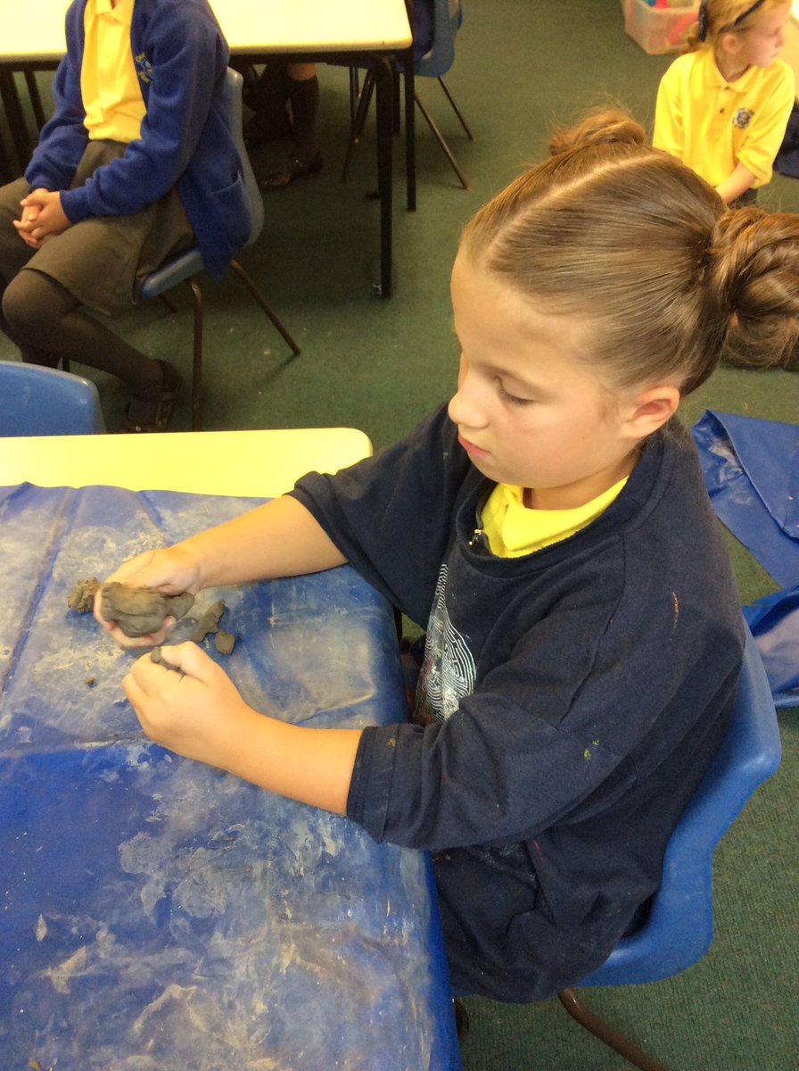 Some great work from 4B today - using adverbs to enhance a description in English and making clay pots in art.