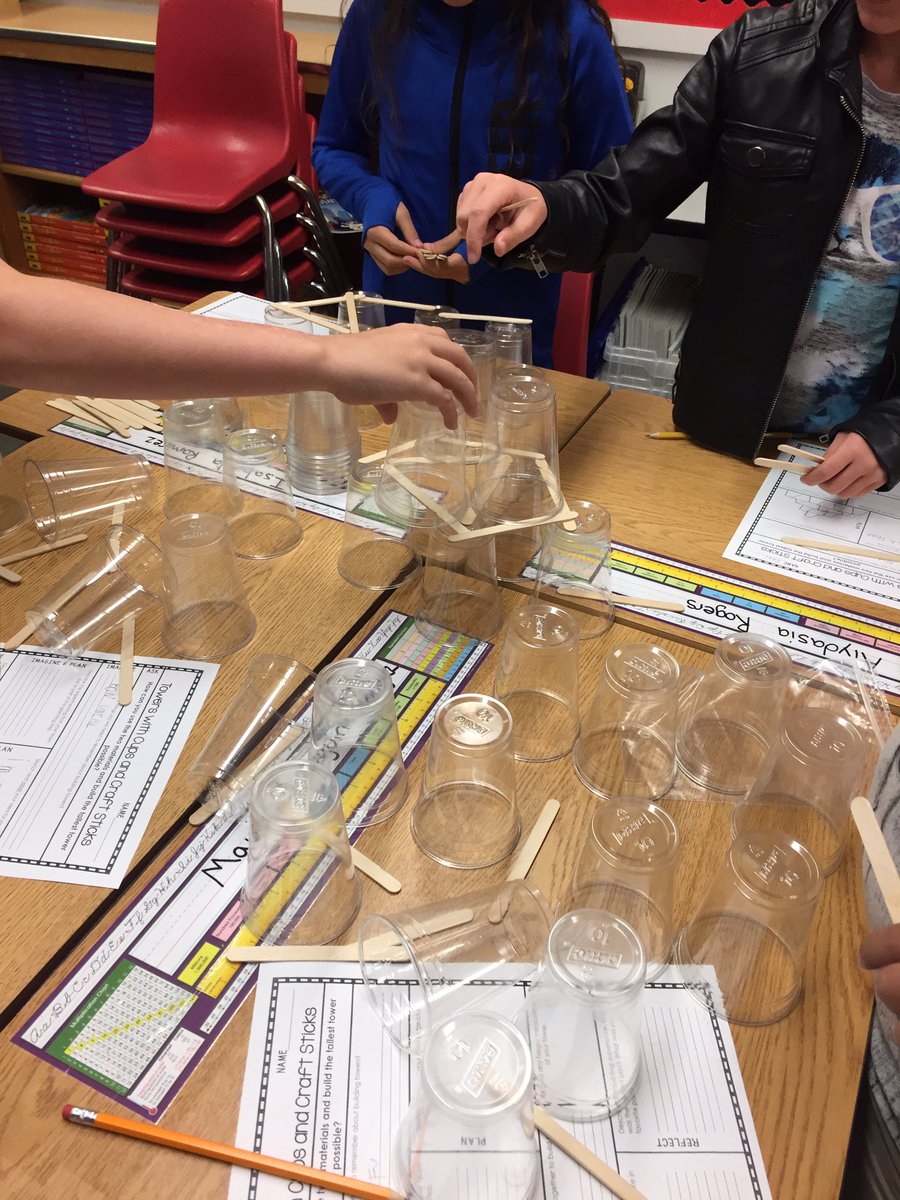 brhammer's tweet photo. Students trying to make the tallest tower with cups and sticks. The challenge: the cups can't touch! #STEM https://t.co/PuR7IUbywQ