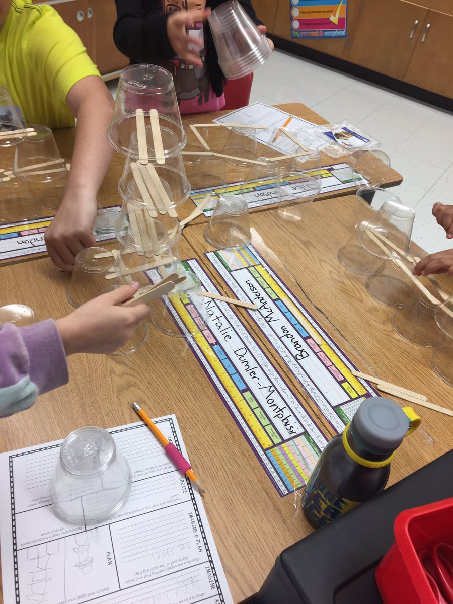 brhammer's tweet photo. Students trying to make the tallest tower with cups and sticks. The challenge: the cups can't touch! #STEM https://t.co/PuR7IUbywQ