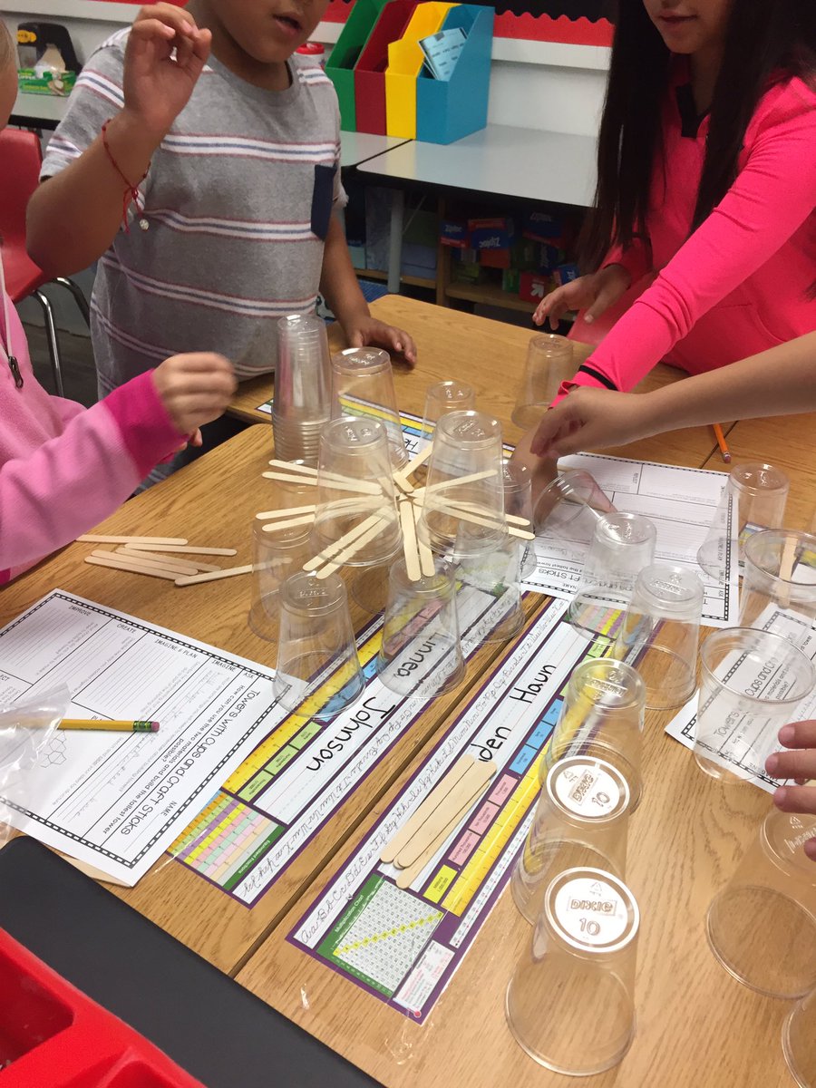 brhammer's tweet photo. Students trying to make the tallest tower with cups and sticks. The challenge: the cups can't touch! #STEM https://t.co/PuR7IUbywQ