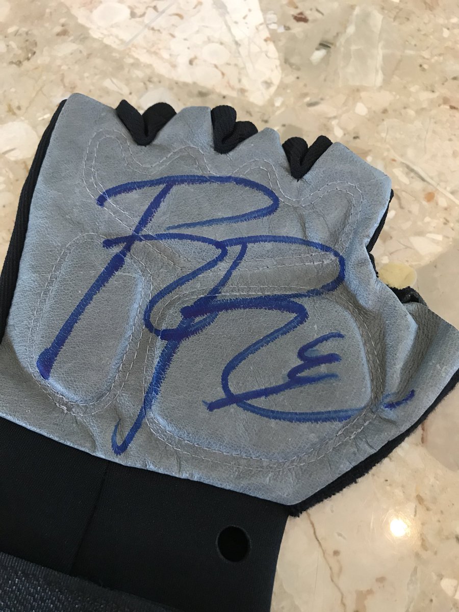 BookerT5x's tweet photo. Here are @WWERomanReigns’ signed gloves! Please bid, all money going to hurricane victims. https://t.co/4WqBlUDmkr https://t.co/dKzqVbL50g