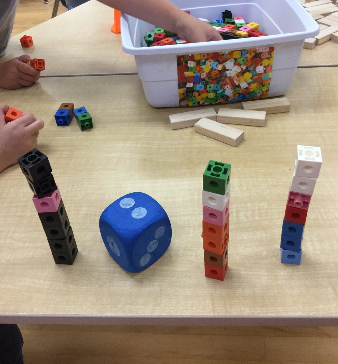 Sarahgat11's tweet image. Having fun with numbers in kindergarten at @OttawaCresPS . We are rolling dice to build the tallest towers we can! #learningalongside