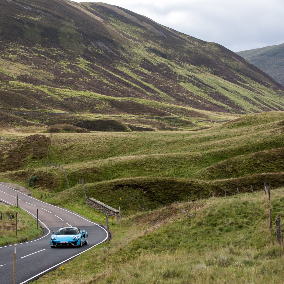 McLarenBevHills's tweet photo. The #McLaren 570S Spider in the Cairngorms. Curacao Blue definitely stands out 🕷 https://t.co/zAEyk3uBDf