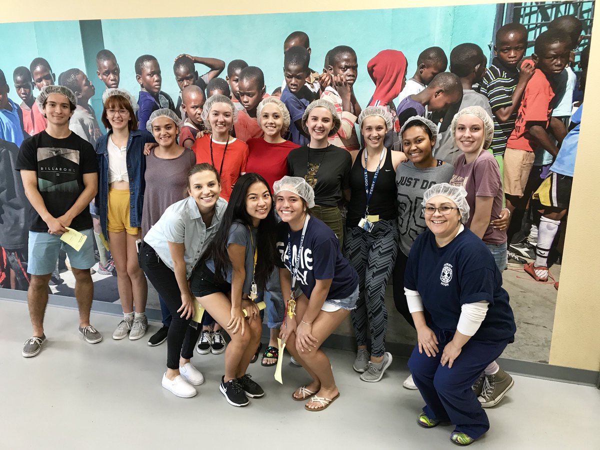 InteractPerry's tweet image. Interact volunteering to pack meals at Feed My Starving Children! @fmsc_org