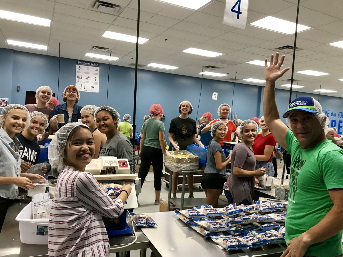InteractPerry's tweet image. Interact volunteering to pack meals at Feed My Starving Children! @fmsc_org