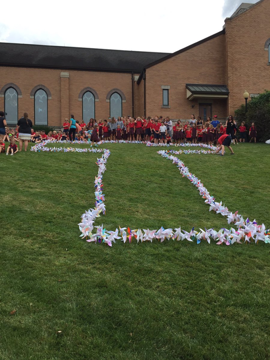 MSHSeureka's tweet photo. Praying for PEACE on International Day of Peace &amp; putting our PINWHEELS on the hillside in the shape of a cross. The way to peace!@archstl https://t.co/8TO1GrkNWx