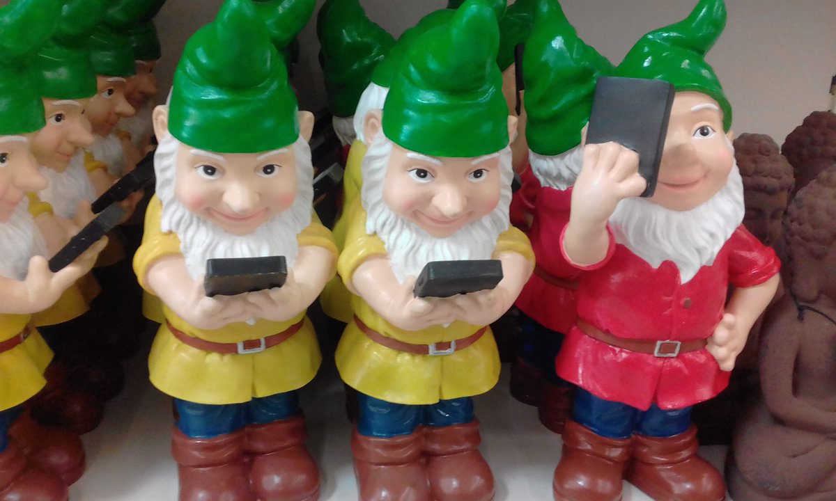 francewitch's tweet photo. WHO THE HELL BUYS THIS **** ? Found atnew #poundstore.I REALLY wanna know😨 #gardengnomes with #mobilephones,& "Children Of The Corn" #dolls. https://t.co/3nnoxVssYR