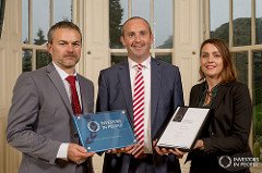 QuiggGolden's tweet photo. Very pleased with our @IIP award at Belfast Castle.  Lisa Keenan &amp; Michael Ferguson receiving the award on behalf of @QuiggGolden. https://t.co/u3VOEgDbLg