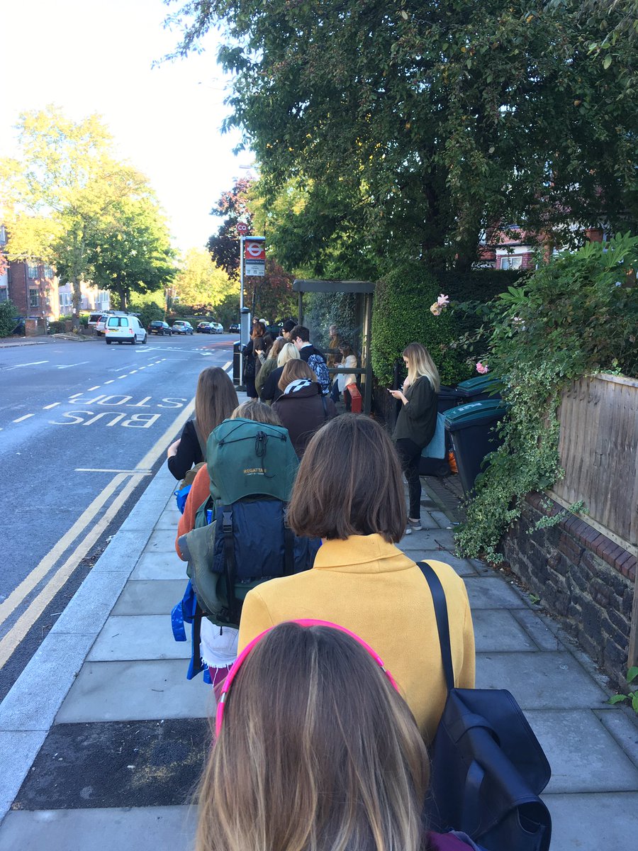 This is peak British queueing right here. An orderly line for the nonexistent bus today. #britishproblems