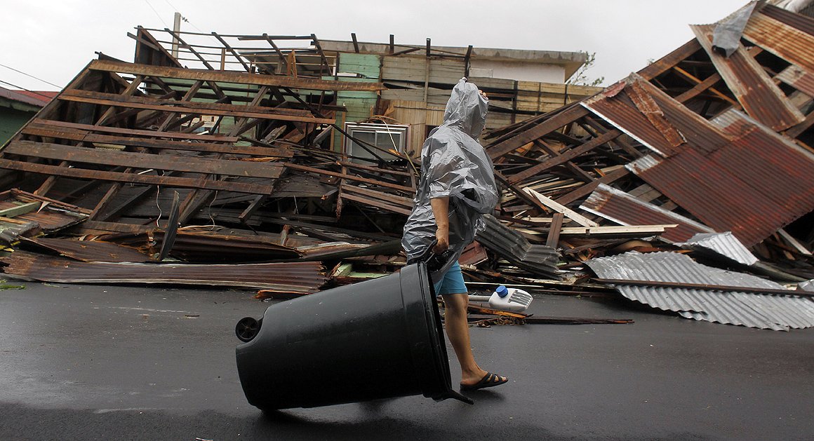politico's tweet photo. Storm-battered Puerto Rico looks to Washington for help https://t.co/XtiU8MPUz8 https://t.co/9ibWGEZJ03