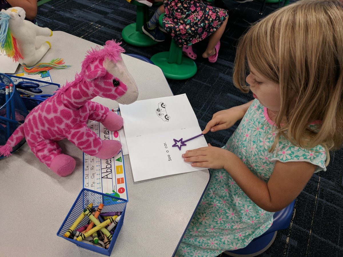 Showing our stuffed animals our fabulous reading skills! #PRPride