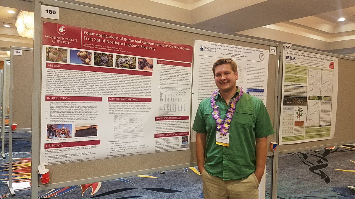 WSU_SmallFruits's tweet photo. Graduate students Matt Arrington and Rachel Rudolph presenting their research posters.  They make me proud! 😊 #ASHS2017 https://t.co/fllHNsaTLI