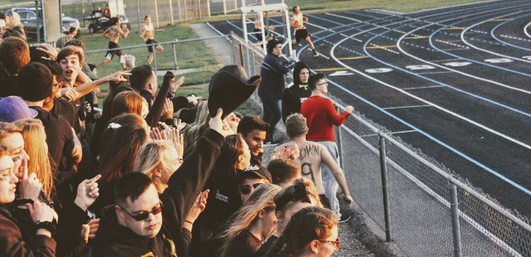 carissanickell's tweet photo. even as the visiting school, our student section was more packed &amp; rowdy than Carroll’s...#rivalnight #dub 😈👏 @GoHHSSpartans 💙💛 #4310 🏈 https://t.co/f0LuYZAQqO
