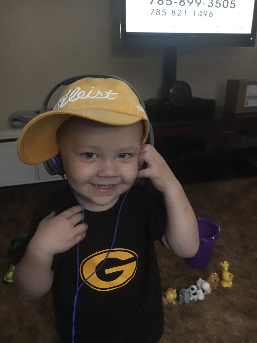 What a happy little guy! We listened to his dads game on the radio.