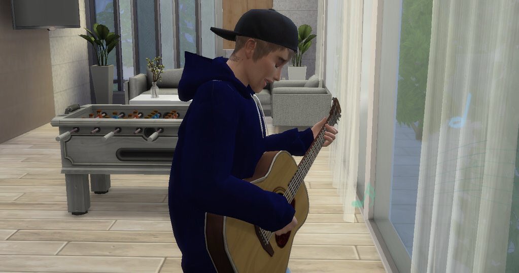 Justin as a sim tweet media