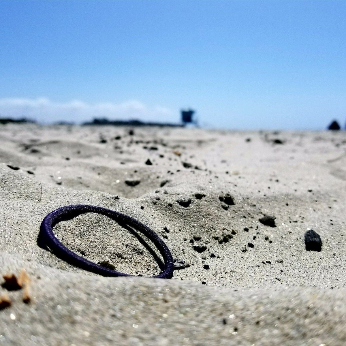 hairtiefighter's tweet photo. All I can see for miles, and miles is lots, and lots of sand...oh, and a hair tie. #theresatowertoo #andbugs #sandybeach #sandytoes #hairtie https://t.co/Vn9fx9rz2p